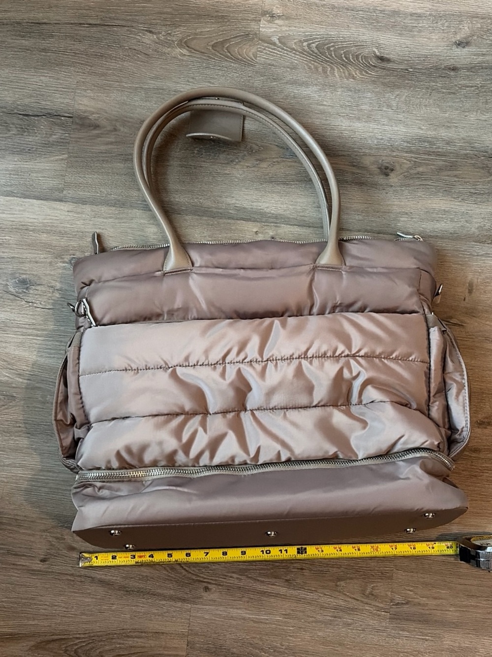Tan puffy travel work bag with removable shoulder strap